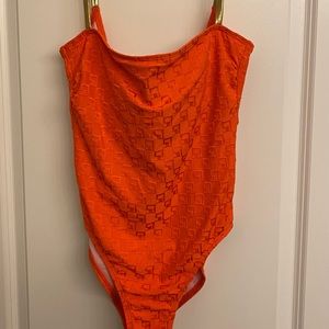 St. John orange one piece swimsuit